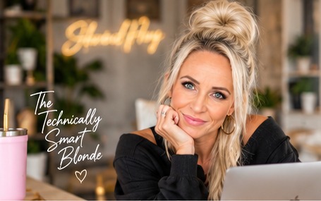 Angie at her desk with a laptop